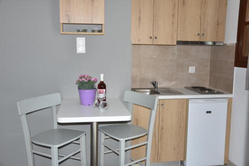 Η κουζίνα ή μικρή κουζίνα στο Stellar Apartments II