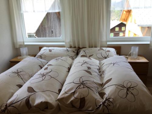Postel nebo postele na pokoji v ubytování Gästehaus Pfandl