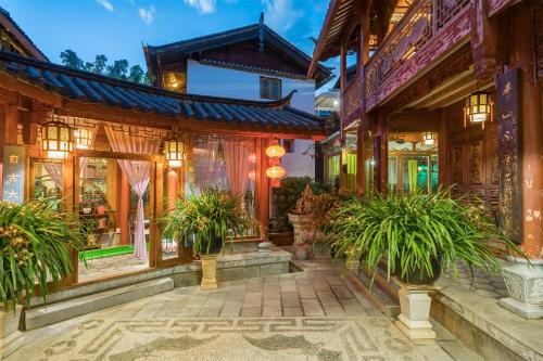 Photo de la galerie de l'établissement Lijiang Sunshine Nali Inn, à Lijiang