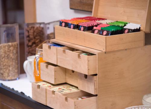 a stack of wooden boxes on a counter at Alpenchalet Stadlpoint in Ried im Zillertal