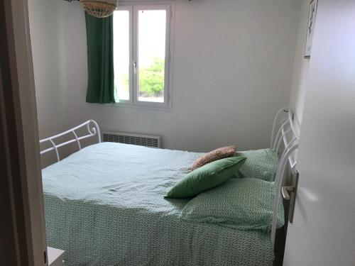Ein Bett oder Betten in einem Zimmer der Unterkunft Le Domaine Vermeil