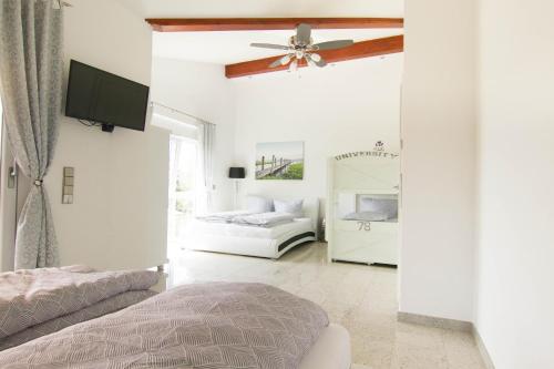 Postel nebo postele na pokoji v ubytování Rust-Fewo-Hotel