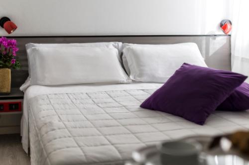 Postel nebo postele na pokoji v ubytování Hotel Boemia