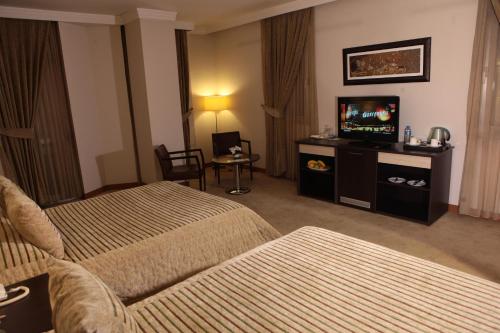 Postel nebo postele na pokoji v ubytování Akkoc Boutique Hotel