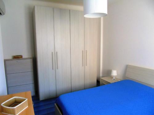 A bed or beds in a room at Deiva Holidays