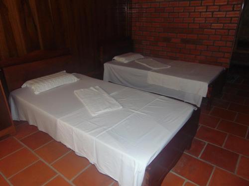 Ένα ή περισσότερα κρεβάτια σε δωμάτιο στο Ba Linh Homestay