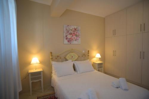 Кровать или кровати в номере G & K City Apartments