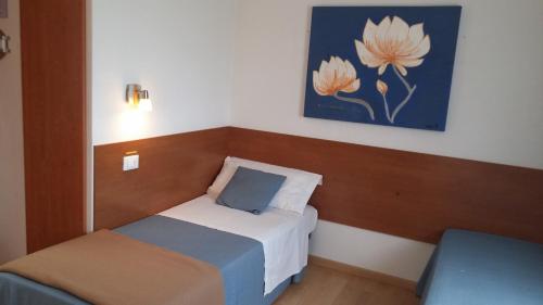 Ένα ή περισσότερα κρεβάτια σε δωμάτιο στο Venice Airport Room