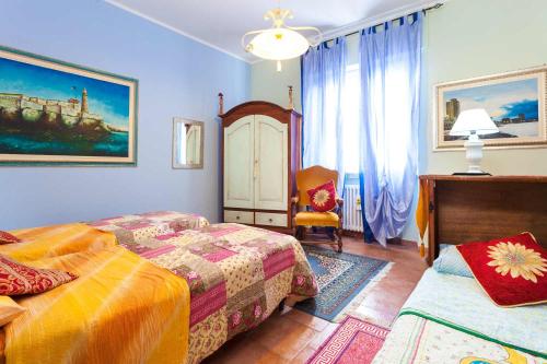 Ένα ή περισσότερα κρεβάτια σε δωμάτιο στο Casa Kita