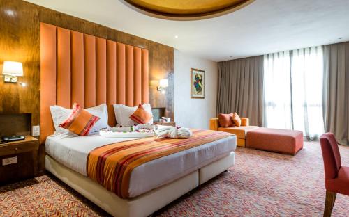 เตียงในห้องที่ Sahara Hotel Agadir - Adults Only