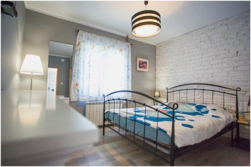 Postel nebo postele na pokoji v ubytování House Mellifera