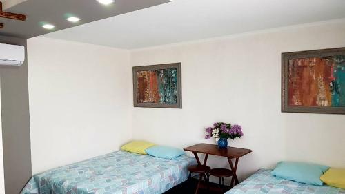 Кровать или кровати в номере Guest House Shafran