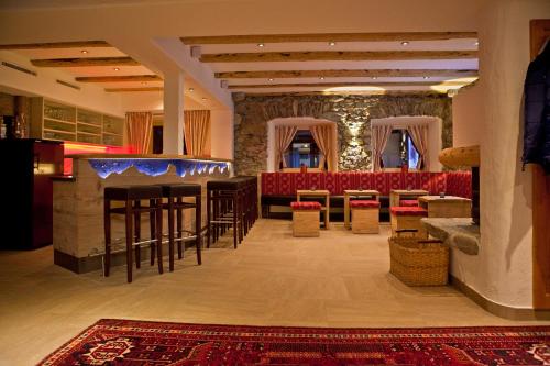 TV a/nebo společenská místnost v ubytování Landhotel Rauchenwalderhof