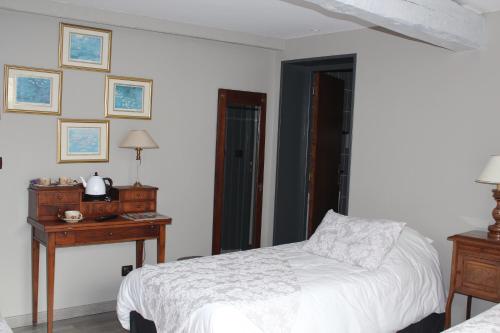 Ένα ή περισσότερα κρεβάτια σε δωμάτιο στο Hypnos Hotel