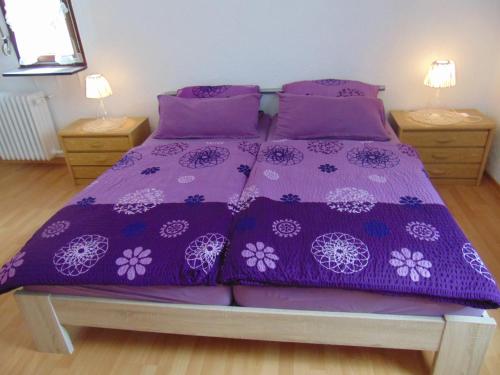 En eller flere senge i et værelse på Gasthaus Rebstock
