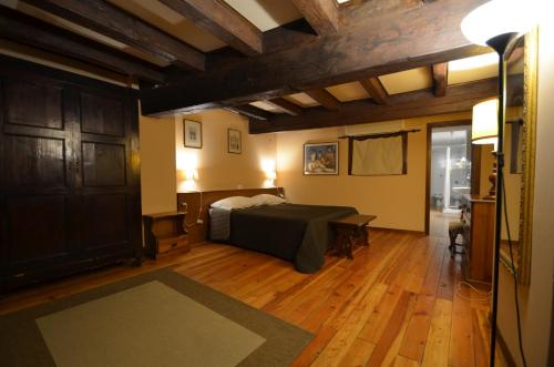 Кровать или кровати в номере Appartamenti Pratello