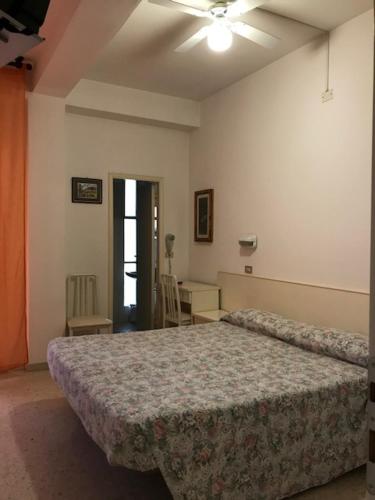 Postel nebo postele na pokoji v ubytování Hotel MIRO'