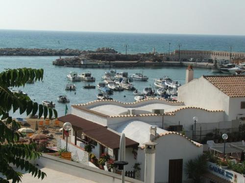 a view of a harbor with boats in the water at Appartamenti Helvetia in Peschici