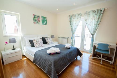 Postel nebo postele na pokoji v ubytování Binny's House Cascais - Renting rooms not the whole house