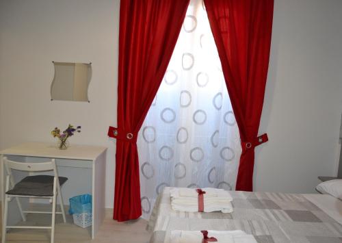 Postel nebo postele na pokoji v ubytování B&B Licata SottoLeStelle