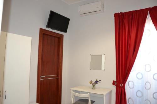 TV a/nebo společenská místnost v ubytování B&B Licata SottoLeStelle