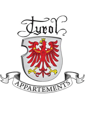 a coat of arms with a red eagle on a shield at Tyrol Appartements in Ehrwald