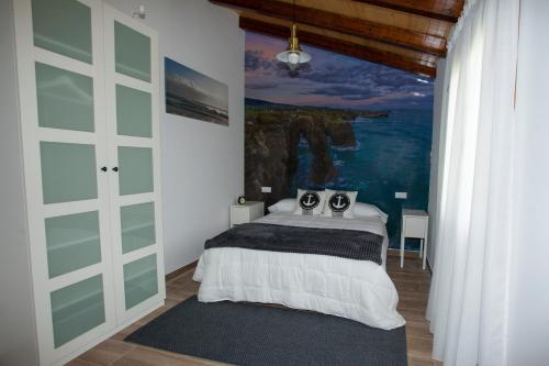 Ένα ή περισσότερα κρεβάτια σε δωμάτιο στο Villas Las Catedrales