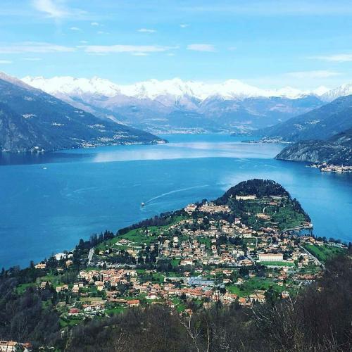 a town on a hill next to a body of water at Sweet House Self Check-in 24h in Cavallasca