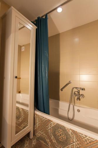 a bathroom with a shower with a tub at Barbarossa House with parking in Cres
