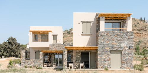 a house in the middle of a desert at Vourkari Village in Vourkarion