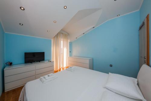Posteľ alebo postele v izbe v ubytovaní Apartments Selak