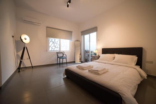 Posteľ alebo postele v izbe v ubytovaní MCPlaces Holiday Apartments