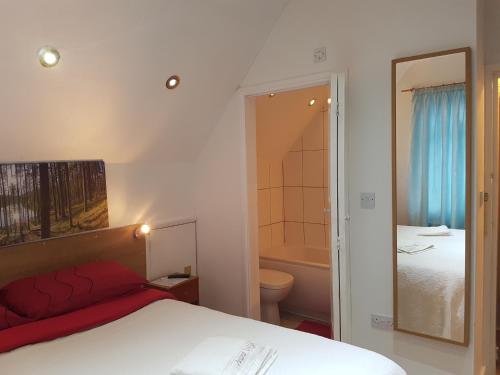 Postel nebo postele na pokoji v ubytování Anand Lodge
