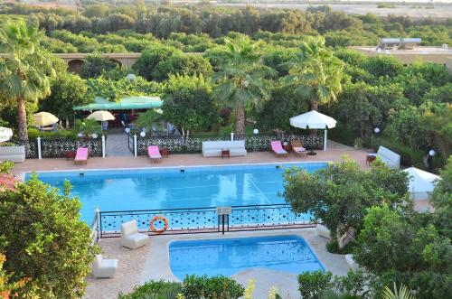 an overhead view of a pool at a resort at Almounia Hotel & Spa in Taroudant