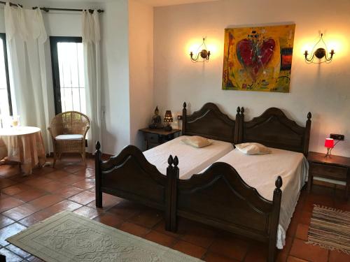 a bedroom with a large bed in a room at Villa Finca Costa Blanca Apartment 1 / Ferienwohnung 1; Monte Pego bei Denia in Monte Pego