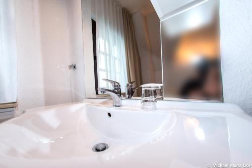 Ένα μπάνιο στο Hotel und Restaurant Löwenbräu Köln