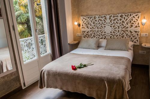 Postelja oz. postelje v sobi nastanitve Casa da Balconada