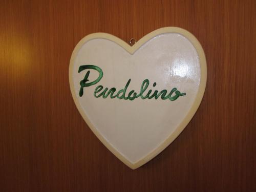 a heart shaped sign with the word pallioliates at villa oliveta in San Gimignano