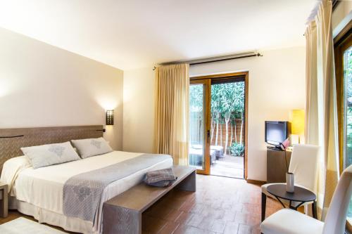 Una cama o camas en una habitación de Hotel Aquadulci