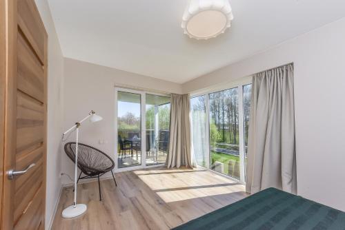 Postel nebo postele na pokoji v ubytování Atsipūskit