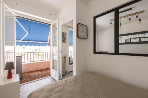 Ένα ή περισσότερα κρεβάτια σε δωμάτιο στο Beautiful Apartment near Monaco