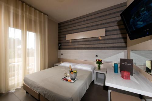 Postel nebo postele na pokoji v ubytování Hotel Rosenblatt