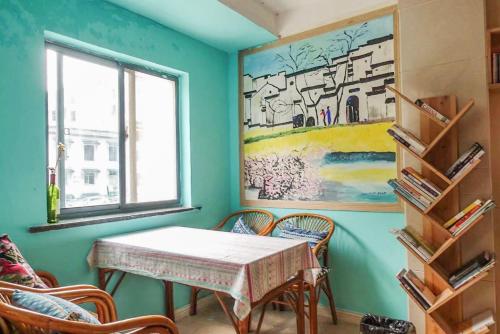 Area soggiorno di Kunlun International Youth Hostel