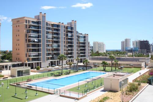 CasaTuris Playa, piscina y parking en Residencial San Juan SJ102