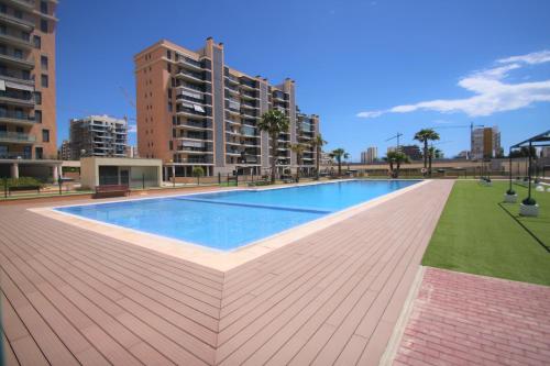 CasaTuris Playa, piscina y parking en Residencial San Juan SJ102
