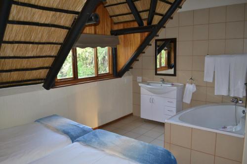 Koupelna v ubytování Kruger Park Lodge - Golf Safari SA
