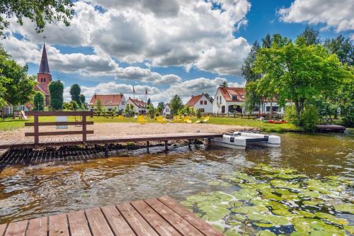 Fotografie z fotogalerie ubytování Mazurska Villa Deluxe w Pasymiu z prywatnym pomostem na jezioro Kalwa i łodzią na wyłączność Najwyższe Premium w Osada Zamkowa v destinaci Pasym