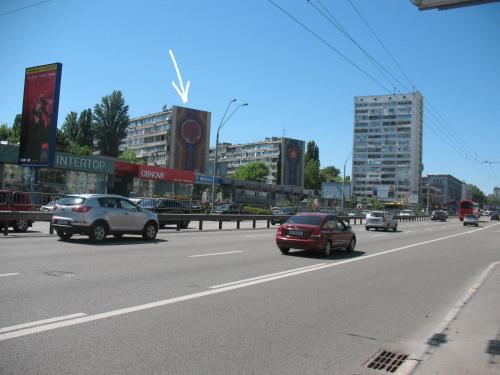 a busy city street with cars driving on the road at Apartments near POLITECH in Kyiv