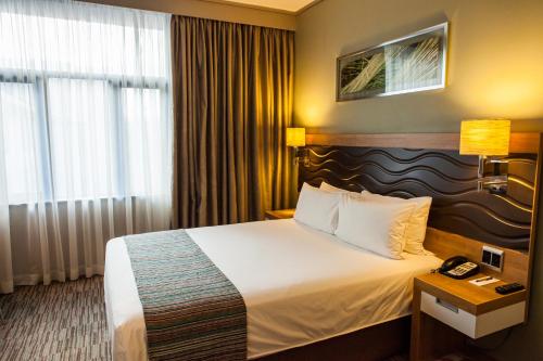 Katil atau katil-katil dalam bilik di Garden Court Umhlanga