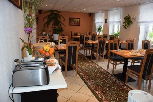 Restaurant ou autre lieu de restauration dans l'établissement Hotel Nordlicht